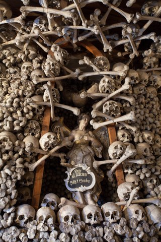 Illustration for article titled These Buildings Are Made with Skulls and Bones